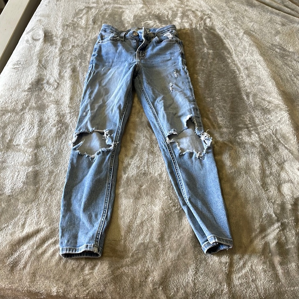Used ripped jeans